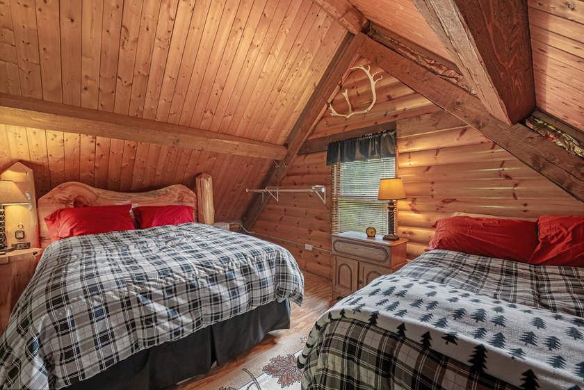 Unique in every way! This spectacular handcrafted full-log home - photo 46