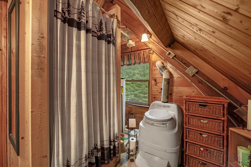 Unique in every way! This spectacular handcrafted full-log home - photo 49