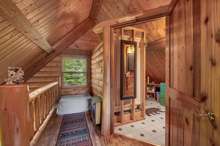 Unique in every way! This spectacular handcrafted full-log home - photo 50