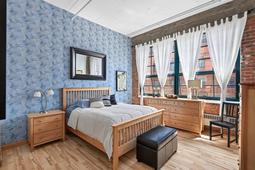 Rare 5th-floor corner loft at American Trio Lofts, filled with - photo 11