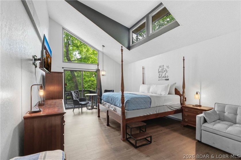 Tucked among the trees in the sought-after Tan-Tar-A Estates - photo 13
