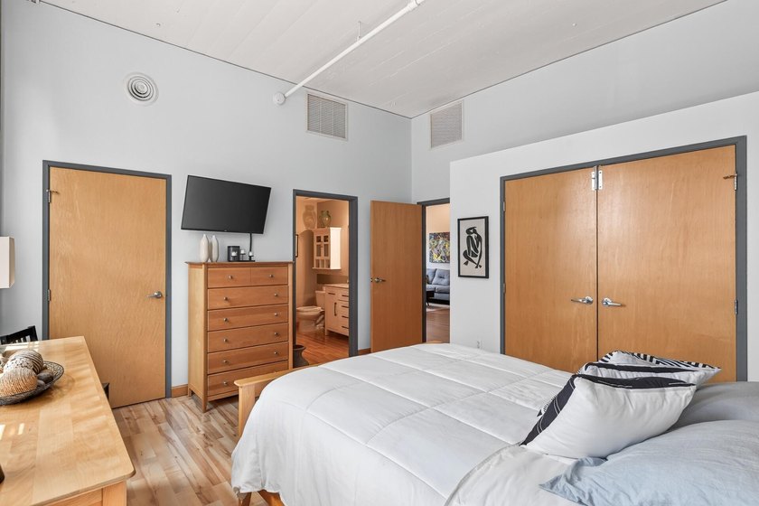 Rare 5th-floor corner loft at American Trio Lofts, filled with - photo 13