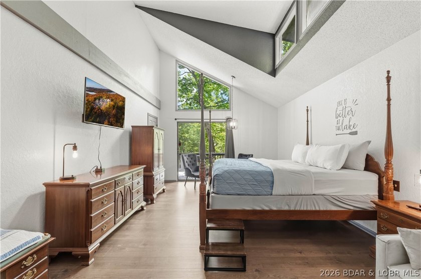 Tucked among the trees in the sought-after Tan-Tar-A Estates - photo 16