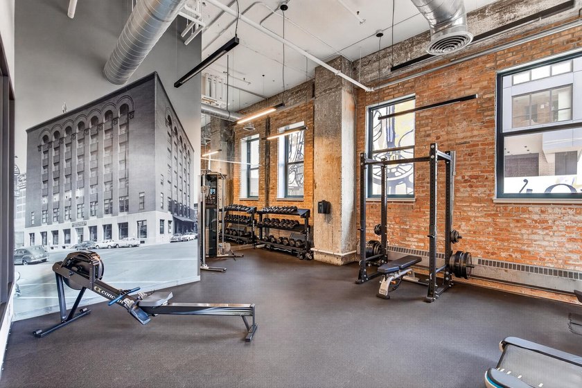 Rare 5th-floor corner loft at American Trio Lofts, filled with - photo 21