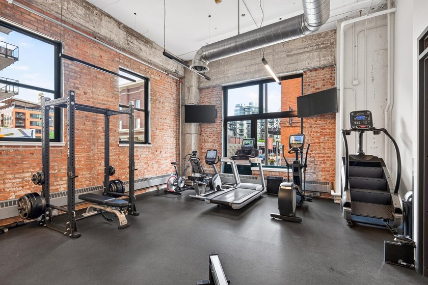 Rare 5th-floor corner loft at American Trio Lofts, filled with - photo 22
