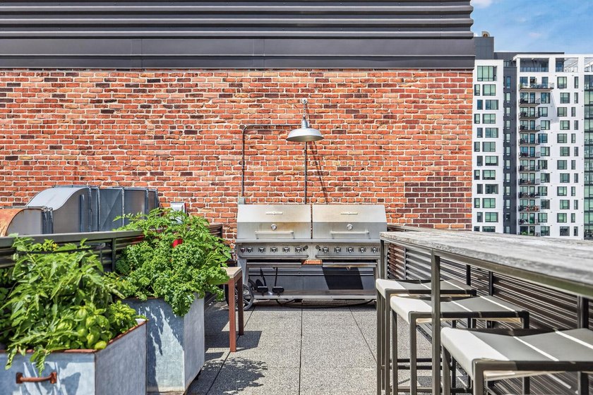 Rare 5th-floor corner loft at American Trio Lofts, filled with - photo 25