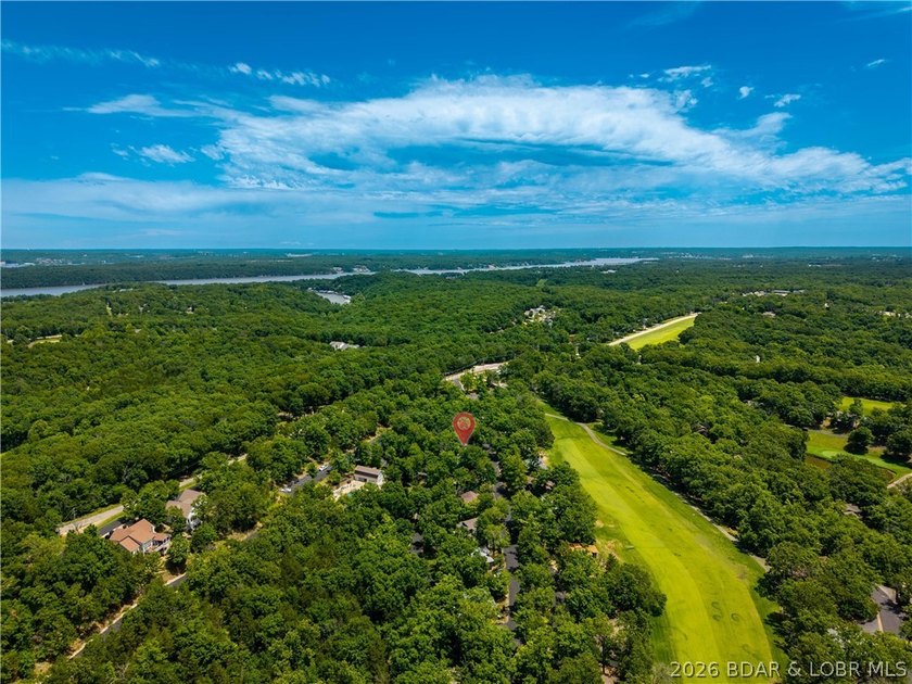 Tucked among the trees in the sought-after Tan-Tar-A Estates - photo 42