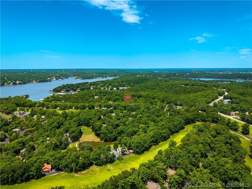 Tucked among the trees in the sought-after Tan-Tar-A Estates - photo 44