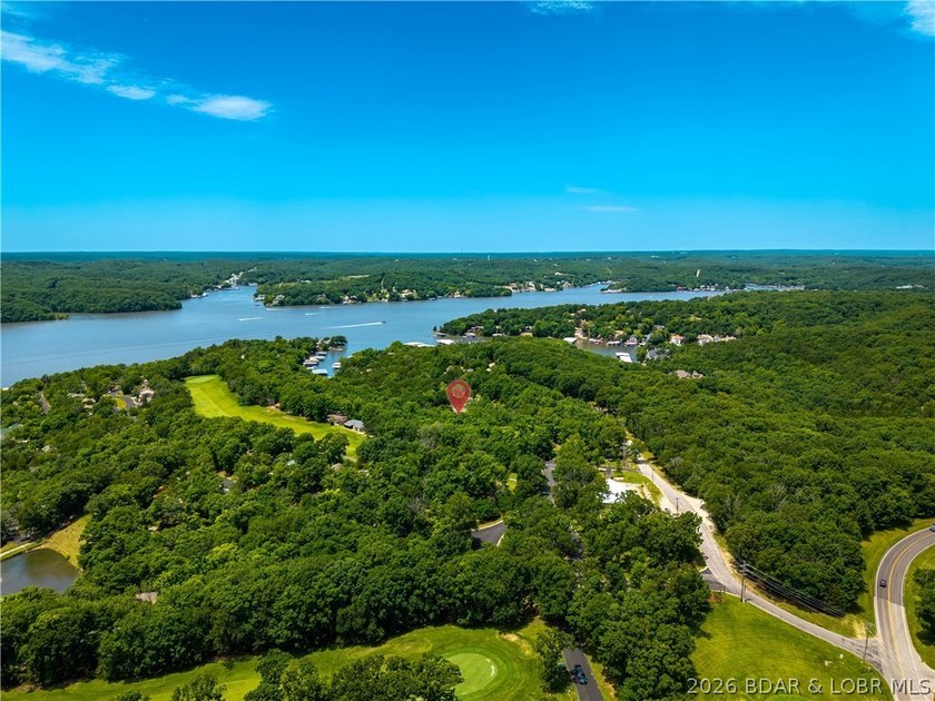 Tucked among the trees in the sought-after Tan-Tar-A Estates - photo 45