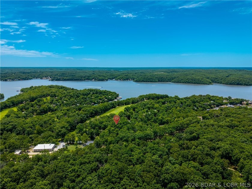 Tucked among the trees in the sought-after Tan-Tar-A Estates - photo 47
