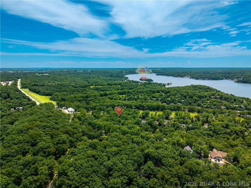 Tucked among the trees in the sought-after Tan-Tar-A Estates - photo 49