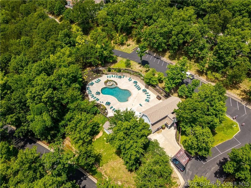 Tucked among the trees in the sought-after Tan-Tar-A Estates - photo 50