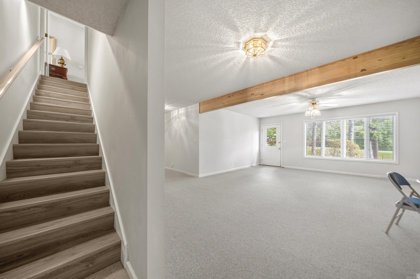 Wake up to sweeping golf course views from this beautifully - photo 21