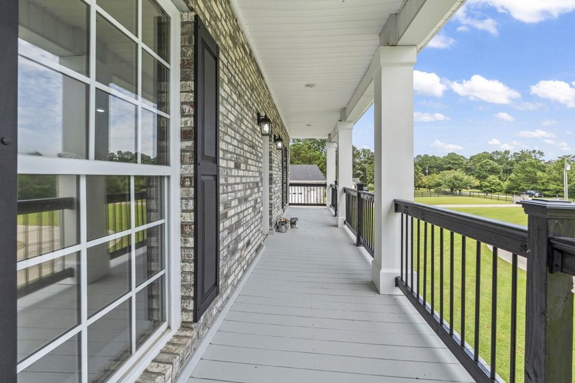 Exceptional all-brick estate set on 3.47 acres in a private - photo 25