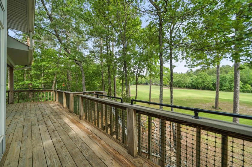 Wake up to sweeping golf course views from this beautifully - photo 32