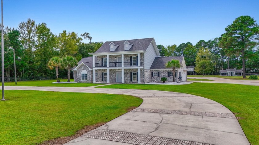 Exceptional all-brick estate set on 3.47 acres in a private - photo 47