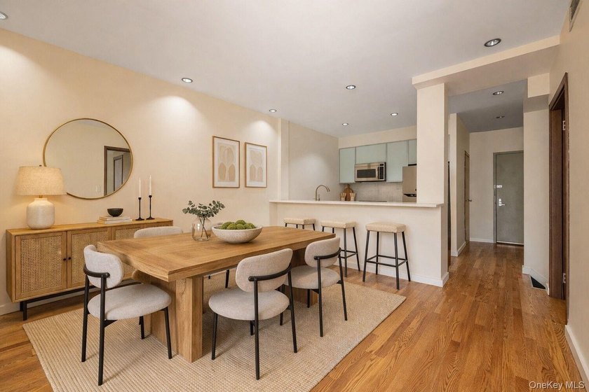 Welcome to Residence 1B, a bright and expansive duplex offering - photo 2