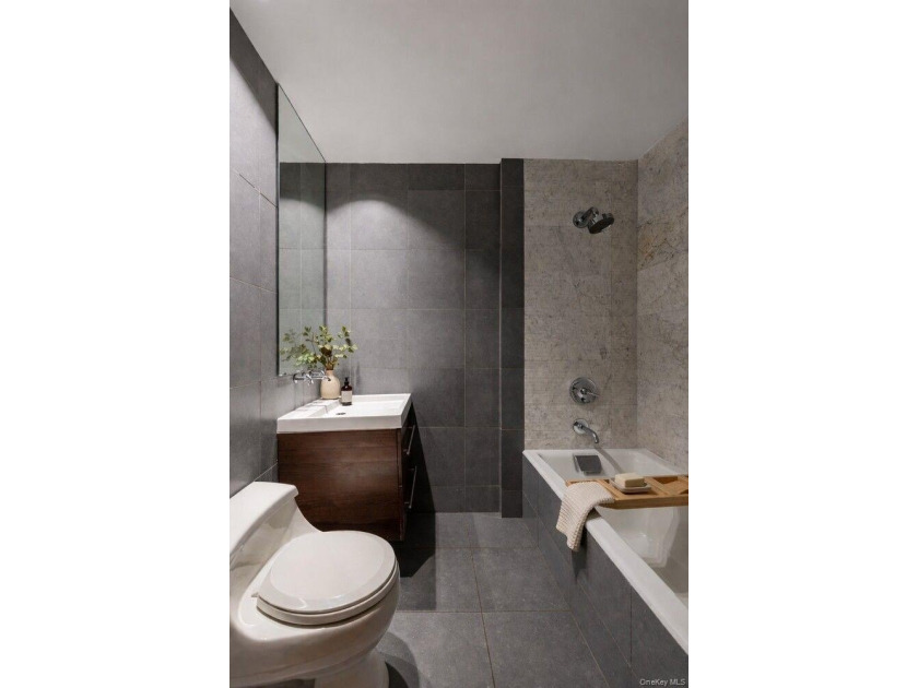 Welcome to Residence 1B, a bright and expansive duplex offering - photo 6