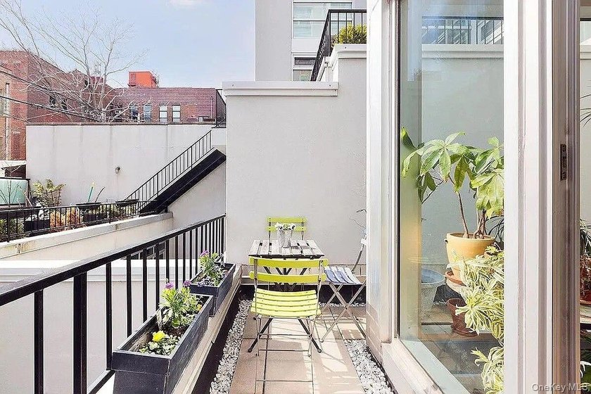 Welcome to Residence 1B, a bright and expansive duplex offering - photo 7