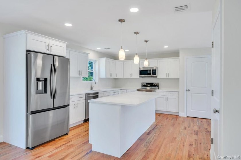 Welcome home in the heart of Mastic; a brand new construction - photo 18