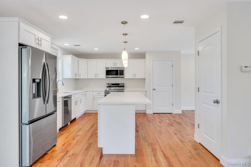 Welcome home in the heart of Mastic; a brand new construction - photo 19