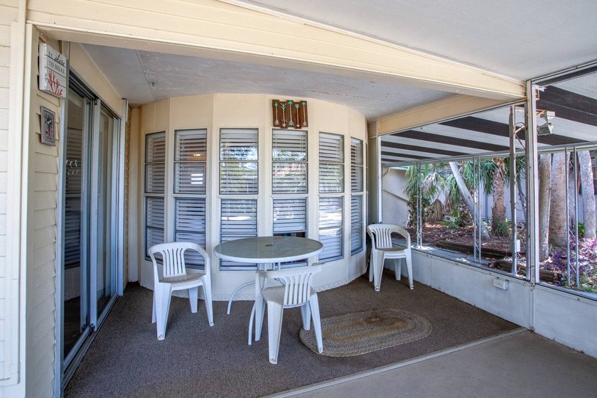 This home is in a beautiful landscaped sitting park area that is - photo 22
