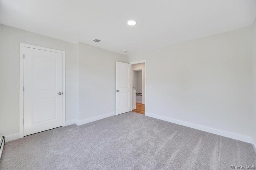 Welcome home in the heart of Mastic; a brand new construction - photo 27