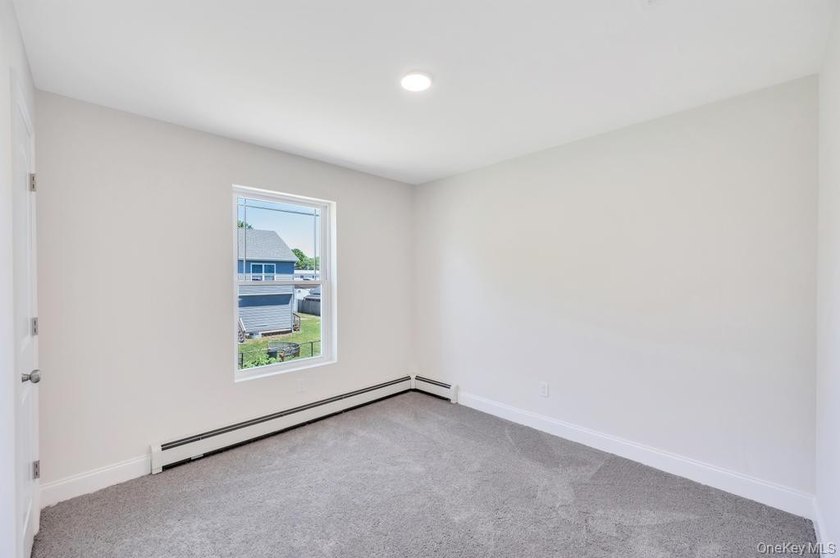 Welcome home in the heart of Mastic; a brand new construction - photo 30