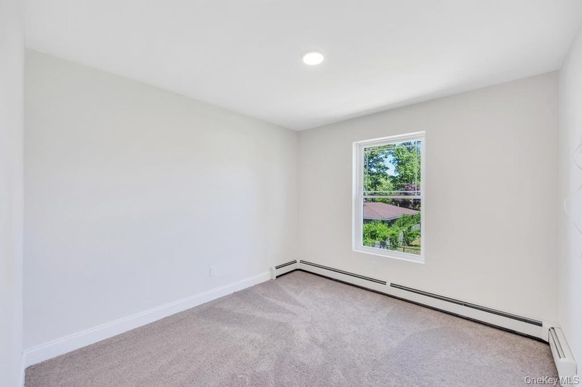 Welcome home in the heart of Mastic; a brand new construction - photo 33