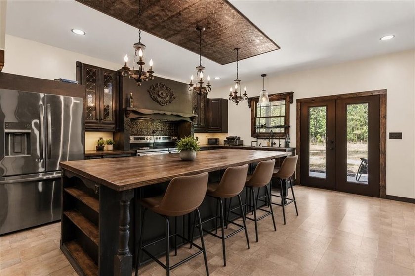 Modern barndominium on 10.28+/- private, wooded acres with TWO - photo 2