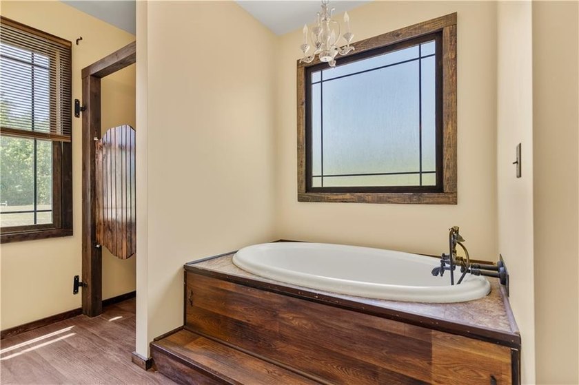 Modern barndominium on 10.28+/- private, wooded acres with TWO - photo 9