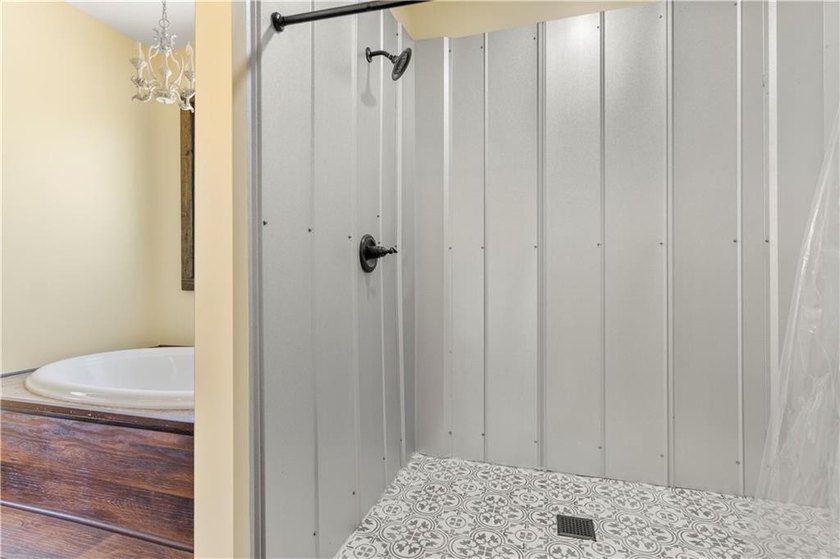 Modern barndominium on 10.28+/- private, wooded acres with TWO - photo 10