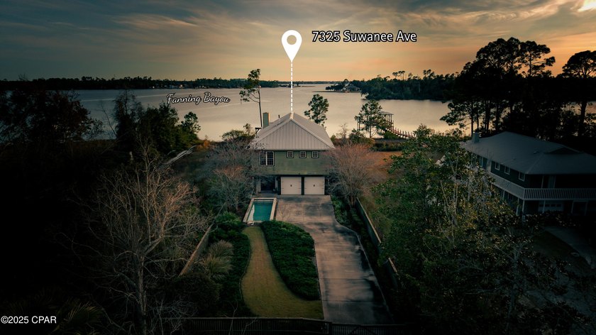 Custom-built in 2004 on 9' pilings with 4' of fill, this 2,172 - photo 3