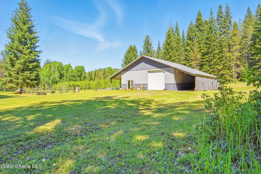Behold a scarce opportunity with large acreage! This stunning - photo 22