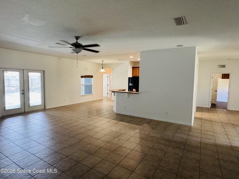 Spacious 4BR/3BA pool home with over 2,300 sq. ft. and a 3-car - photo 3