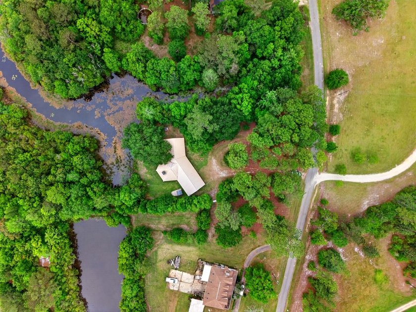 Secluded from the road and situated on 2.91 beautiful acres this - photo 44