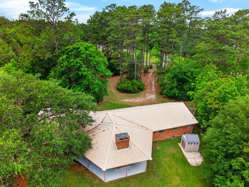 Secluded from the road and situated on 2.91 beautiful acres this - photo 45