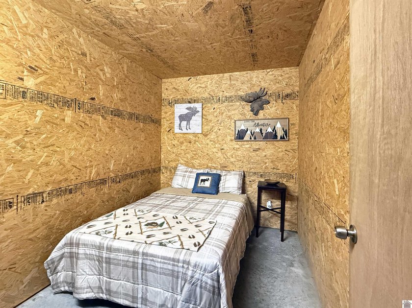 SECLUDED! Tucked away on 1.75 wooded acres, this cute 3-bedroom - photo 12