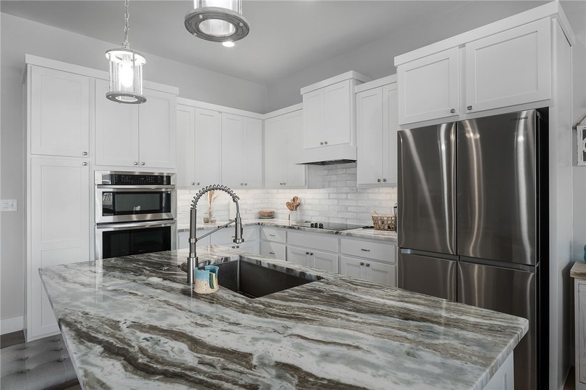 Experience coastal living at its finest in this beautifully - photo 9