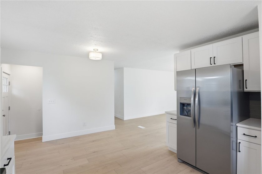 MOVE IN READY 3-bedroom, 1.5-bath ranch with a 1-car garage and - photo 10
