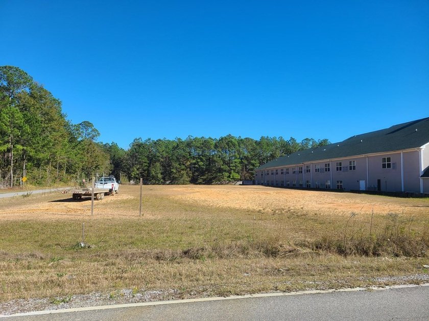 PERFECT LOCATION! THIS PRIME COMMERCIAL PROPERTY IS DIRECTLY OFF - photo 6