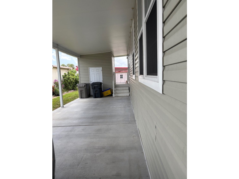 THIS IS A GREAT HOME WITH OPEN FLOOR PLAN AND CARPORT THAT CAN - photo 2