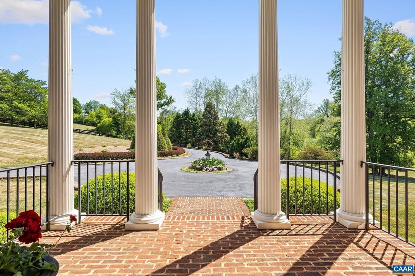 Set on nearly 6 park-like acres with frontage on Ivy Creek this - photo 4
