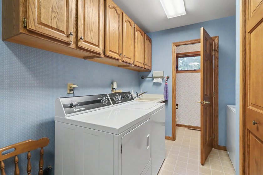 Nestled among towering Northwoods pines on 1.5+ acres, this - photo 16