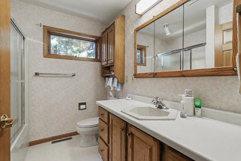 Nestled among towering Northwoods pines on 1.5+ acres, this - photo 21