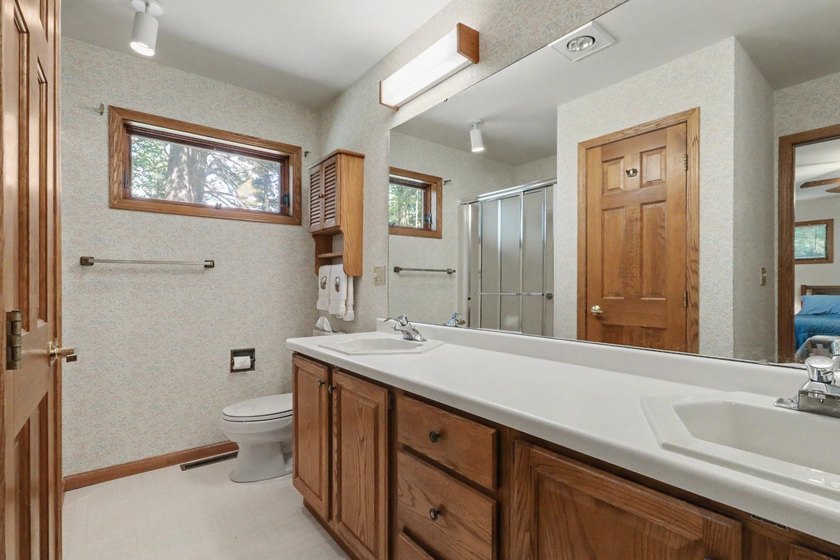 Nestled among towering Northwoods pines on 1.5+ acres, this - photo 22