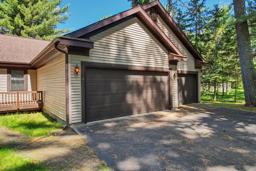 Nestled among towering Northwoods pines on 1.5+ acres, this - photo 35