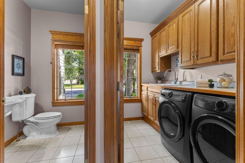Welcome to this five-bedroom, four-bathroom, two-story home on a - photo 13