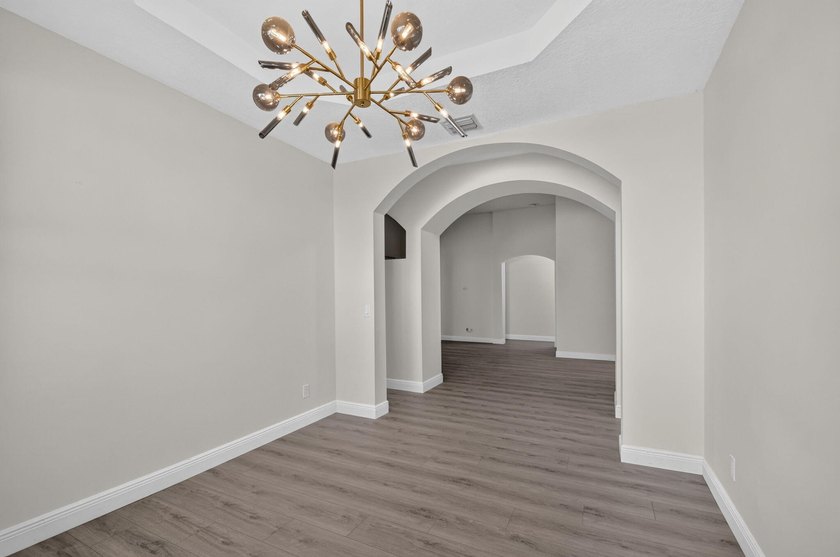 Welcome to this pristine, single-story pool home zoned for - photo 15