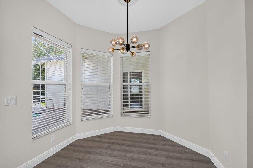 Welcome to this pristine, single-story pool home zoned for - photo 21